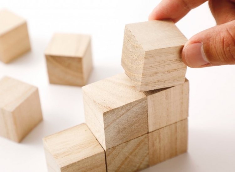 Bouwstenen weerspiegelen de elementen die een organisatie aantrekkelijk maken.